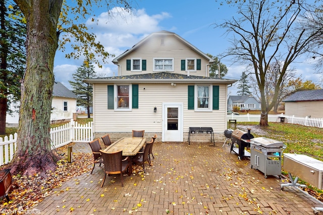 rear view of house featuring a patio area