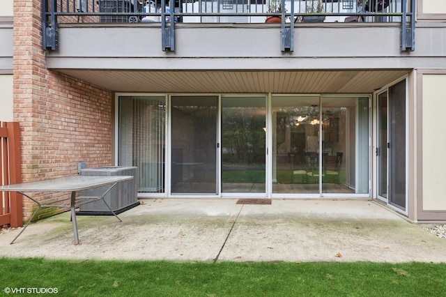 view of patio / terrace with central AC unit