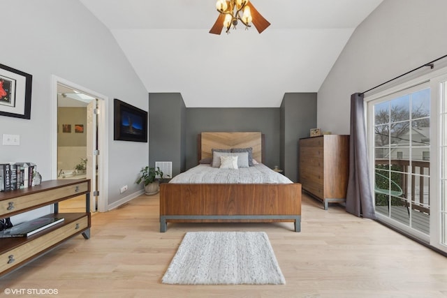 bedroom featuring lofted ceiling, access to outside, ensuite bath, light hardwood / wood-style flooring, and ceiling fan