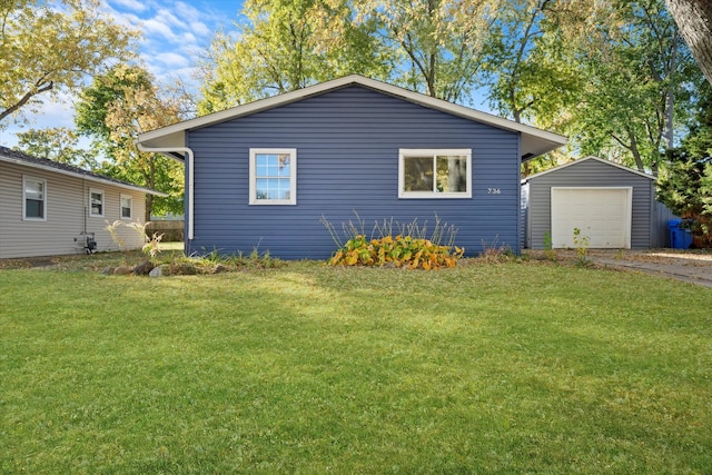 view of property exterior featuring a yard, an outbuilding, and a garage