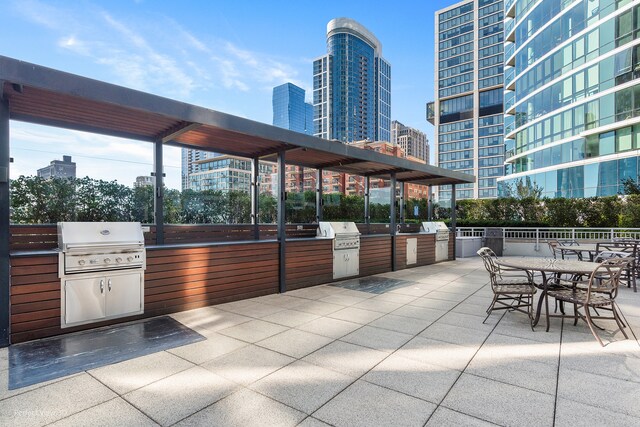 view of patio / terrace featuring grilling area and exterior kitchen