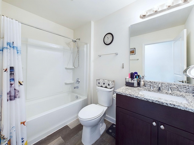 full bathroom with vanity, hardwood / wood-style flooring, toilet, and shower / bathtub combination with curtain