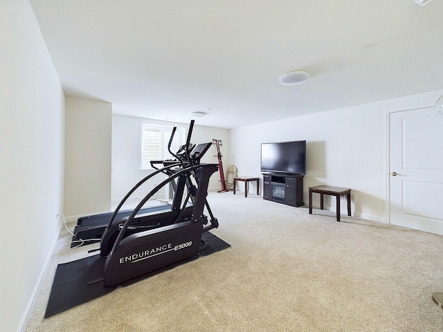 exercise room with carpet floors