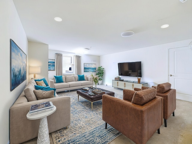 living room featuring light carpet