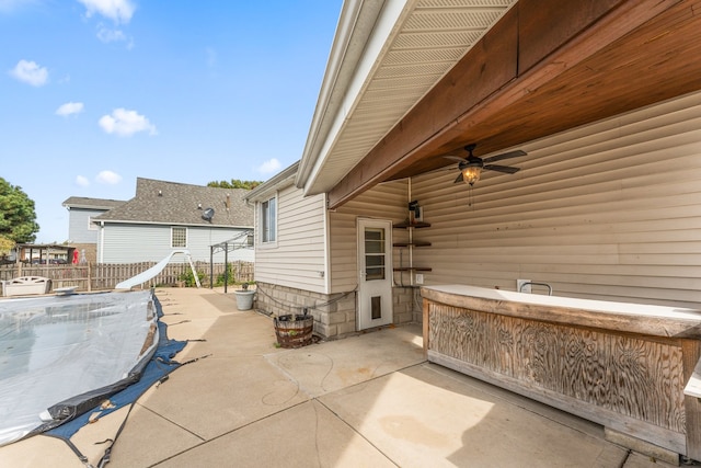 view of patio / terrace featuring ceiling fan