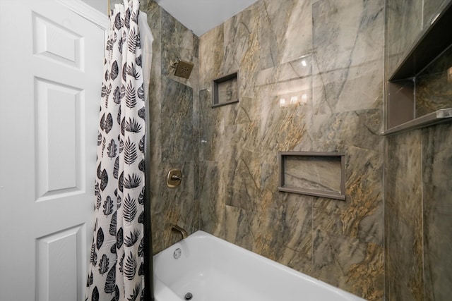 bathroom with shower / bath combo