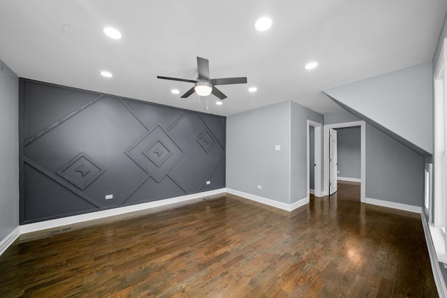 additional living space featuring ceiling fan and dark hardwood / wood-style floors