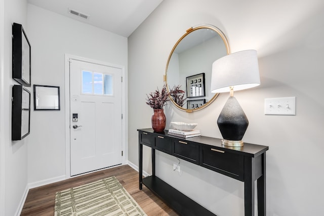 living room featuring light hardwood / wood-style floors and sink