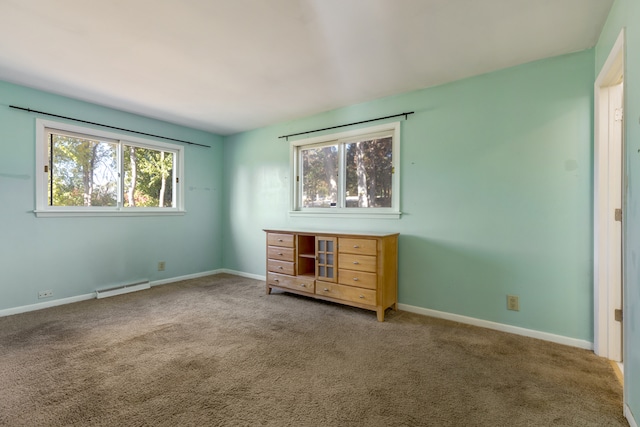 unfurnished bedroom with carpet