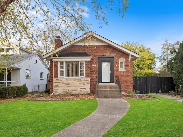 bungalow with a front lawn