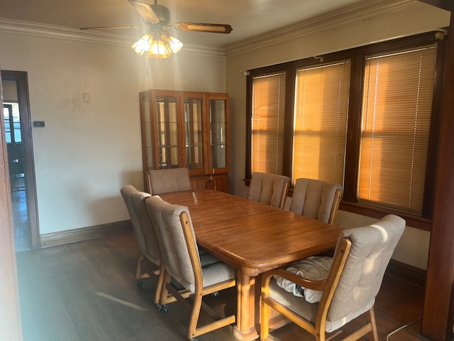 dining area with ceiling fan and ornamental molding