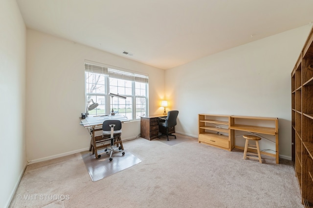 home office with light colored carpet