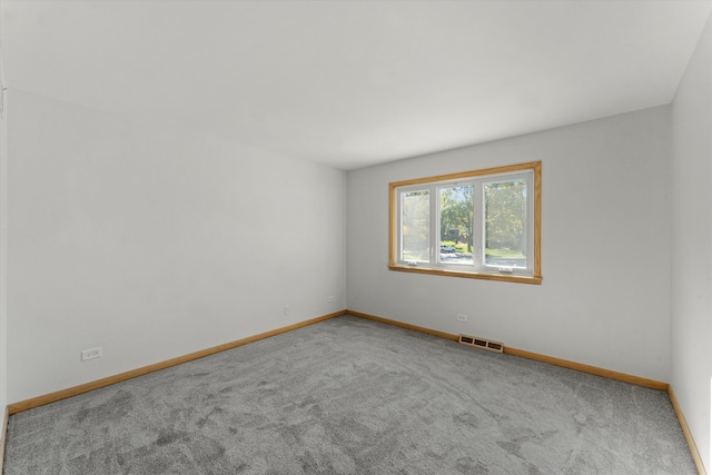 spare room with carpet flooring