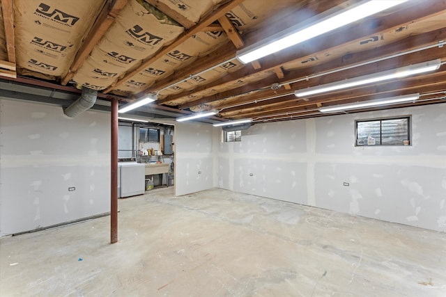 basement with washer / dryer and electric panel