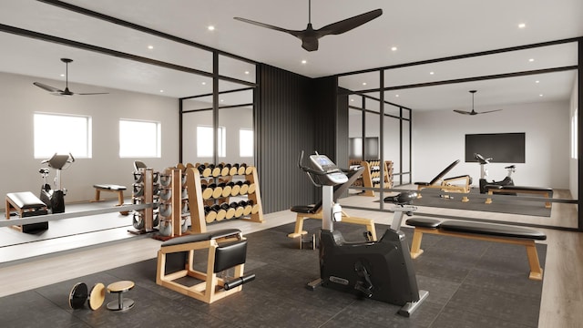 gym with ceiling fan and dark hardwood / wood-style floors