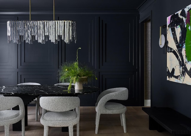 dining area with hardwood / wood-style floors