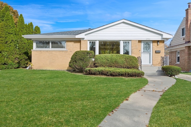 view of front of home with a front yard