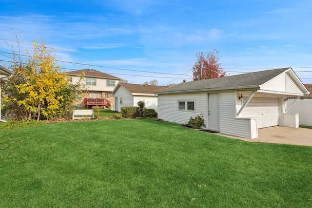 back of house with a lawn and a wooden deck