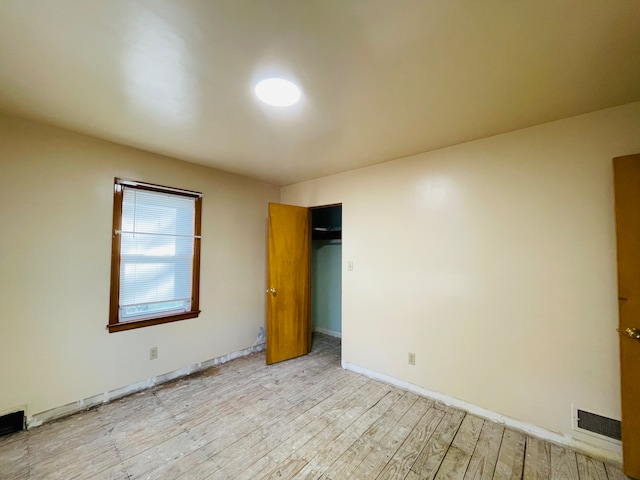 unfurnished bedroom featuring light hardwood / wood-style flooring