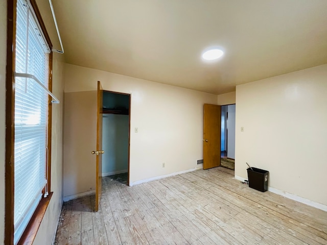 unfurnished bedroom featuring light hardwood / wood-style flooring