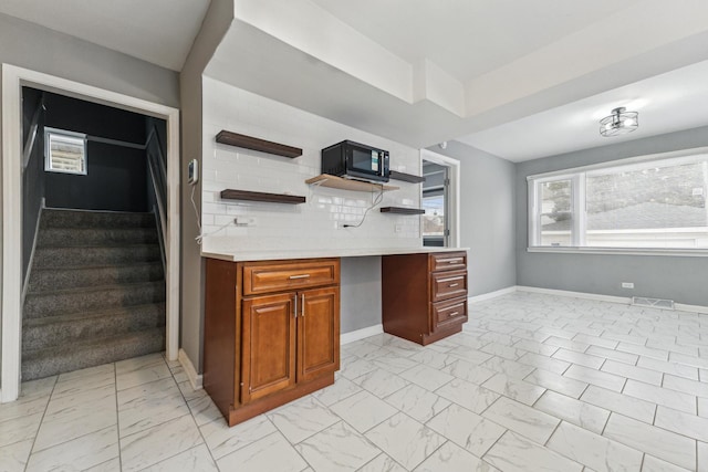 kitchen featuring backsplash