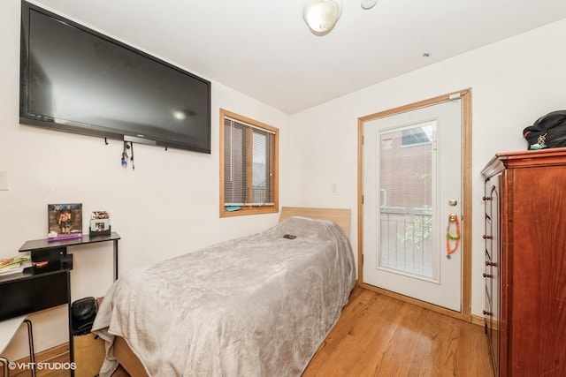 bedroom with light hardwood / wood-style flooring