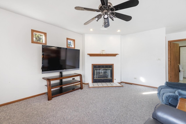 living room with carpet and ceiling fan