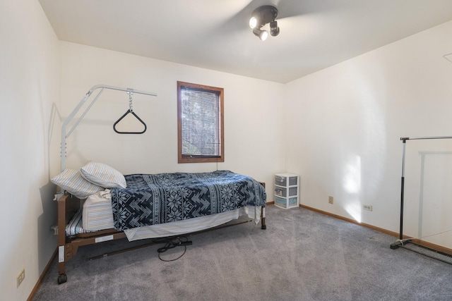 bedroom featuring light colored carpet