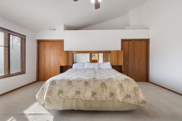 bedroom featuring light colored carpet, high vaulted ceiling, and ceiling fan