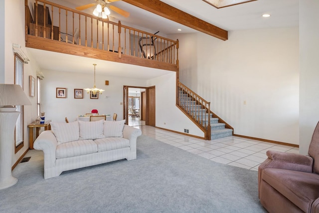 living room with beamed ceiling, ceiling fan, high vaulted ceiling, and light tile patterned floors