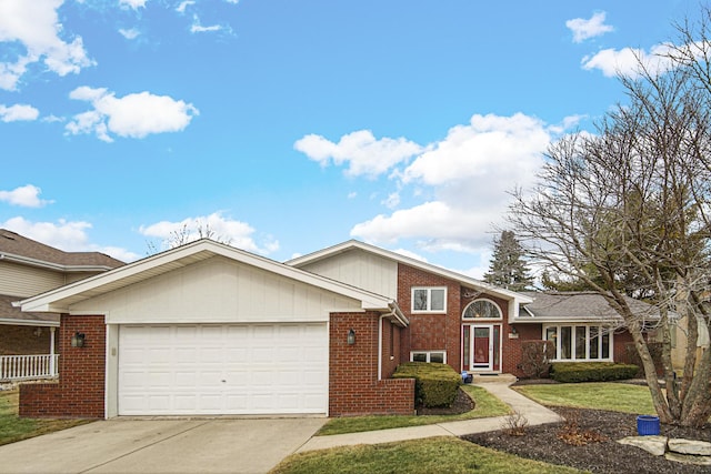 view of front of property with a garage, a front lawn, concrete driveway, and brick siding