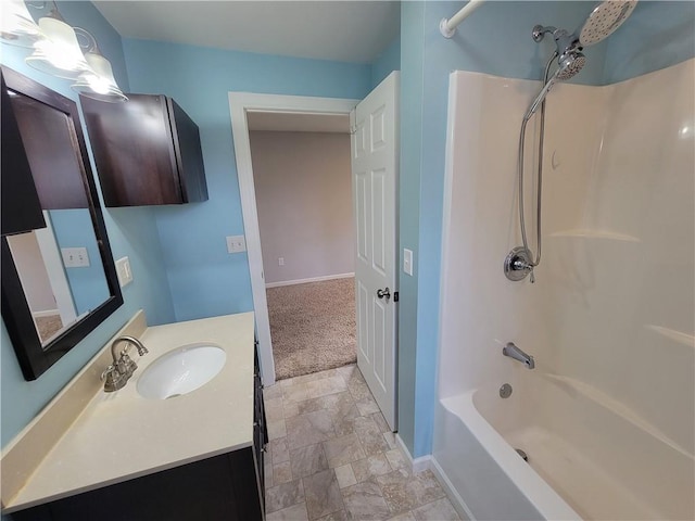 bathroom with vanity and shower / tub combination