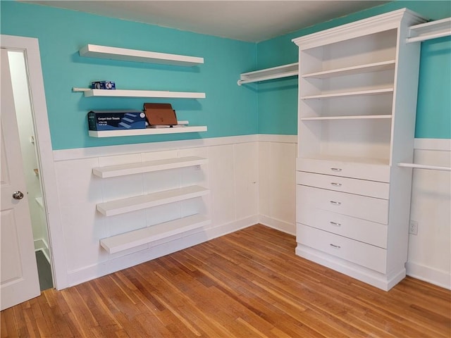 walk in closet featuring light wood-type flooring