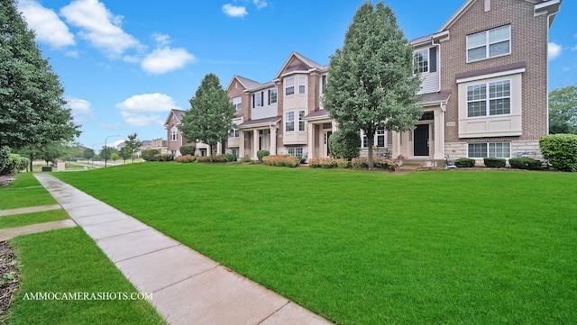 view of front of house featuring a front lawn