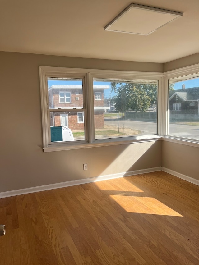 empty room featuring hardwood / wood-style flooring