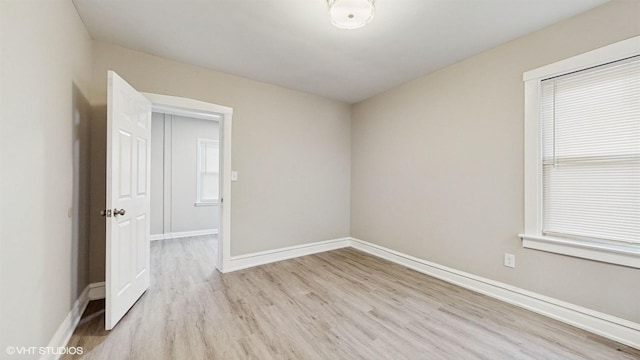 empty room featuring light hardwood / wood-style floors