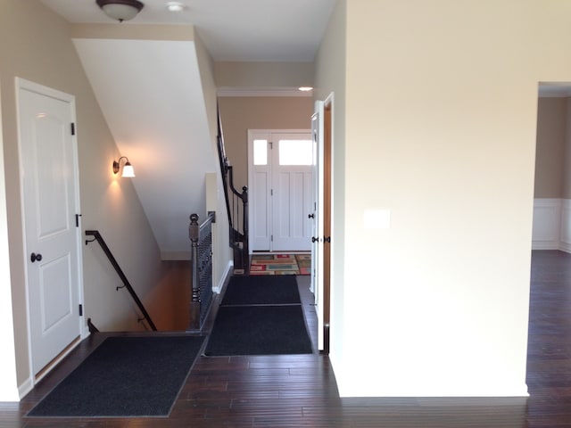 hall with dark hardwood / wood-style floors