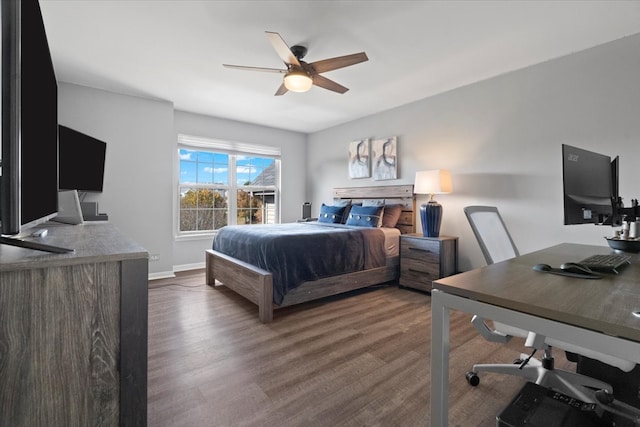 bedroom featuring dark hardwood / wood-style floors and ceiling fan