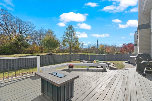 deck with an outdoor fire pit