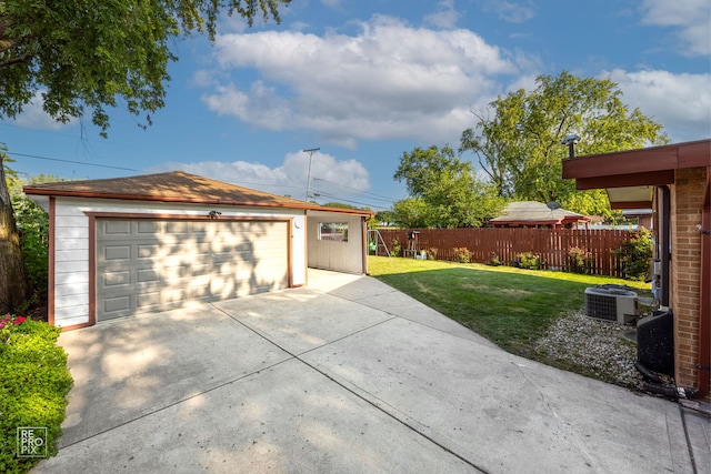 exterior space featuring a yard and central AC unit