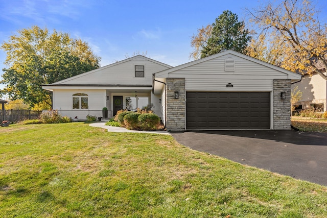 ranch-style house with a front yard and a garage