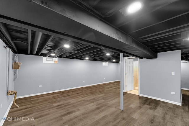 basement with wood-type flooring