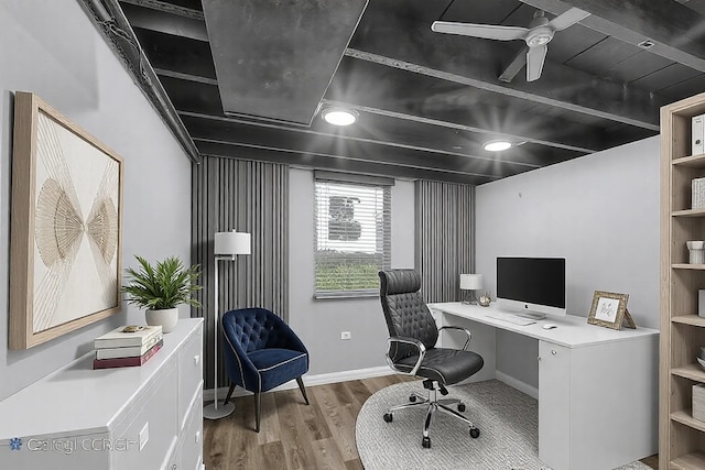 office space with ceiling fan and light wood-type flooring