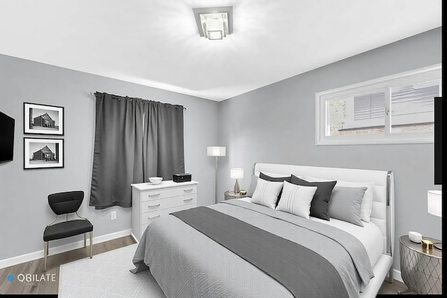 bedroom featuring light hardwood / wood-style flooring