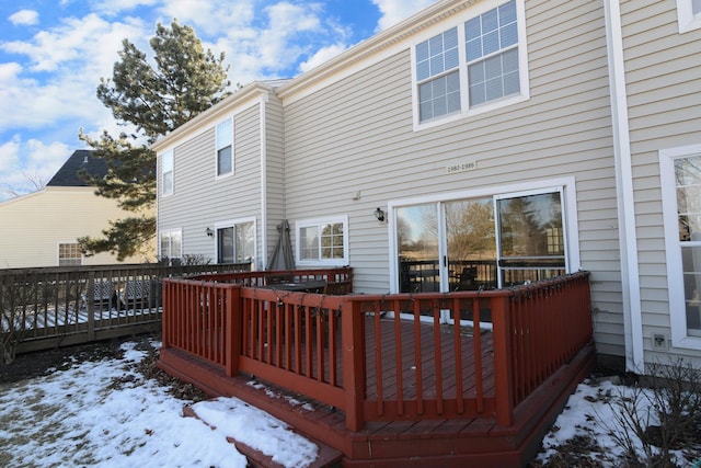 view of snow covered deck