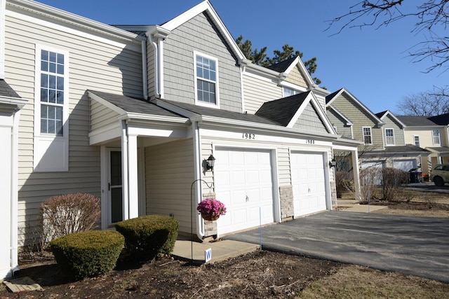 view of side of property featuring a garage