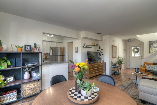 dining room featuring hardwood / wood-style flooring