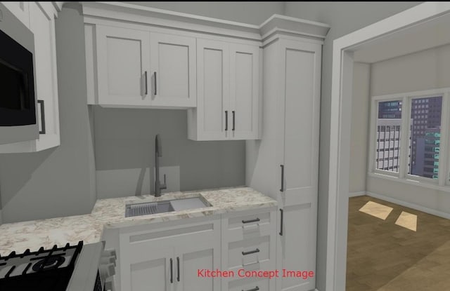 3600 N Lake Shore Dr Unit 622, Chicago, IL 60613 - kitchen with wood finished floors, light stone counters, and white cabinets