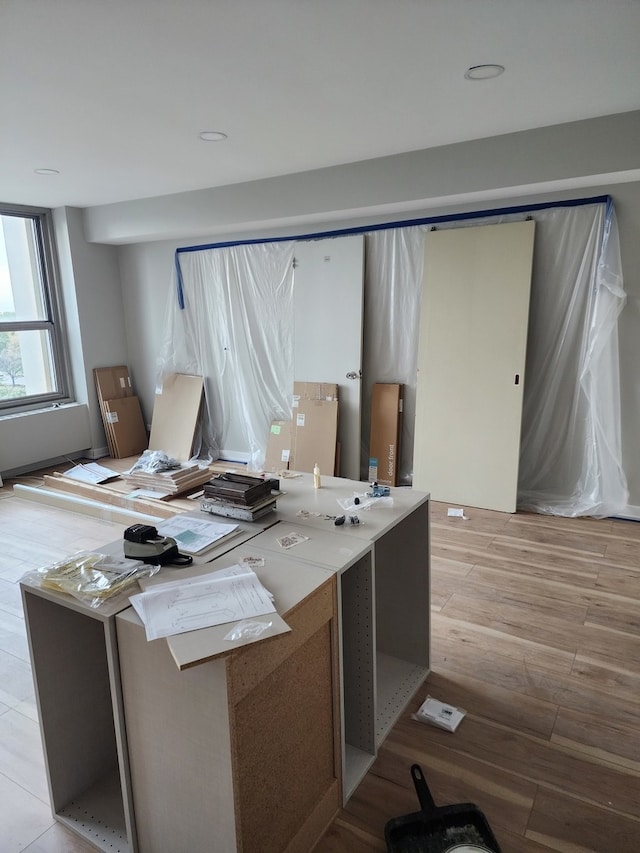 home office featuring light hardwood / wood-style flooring