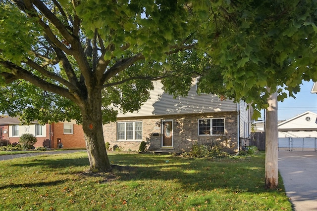 view of front of home with a front lawn